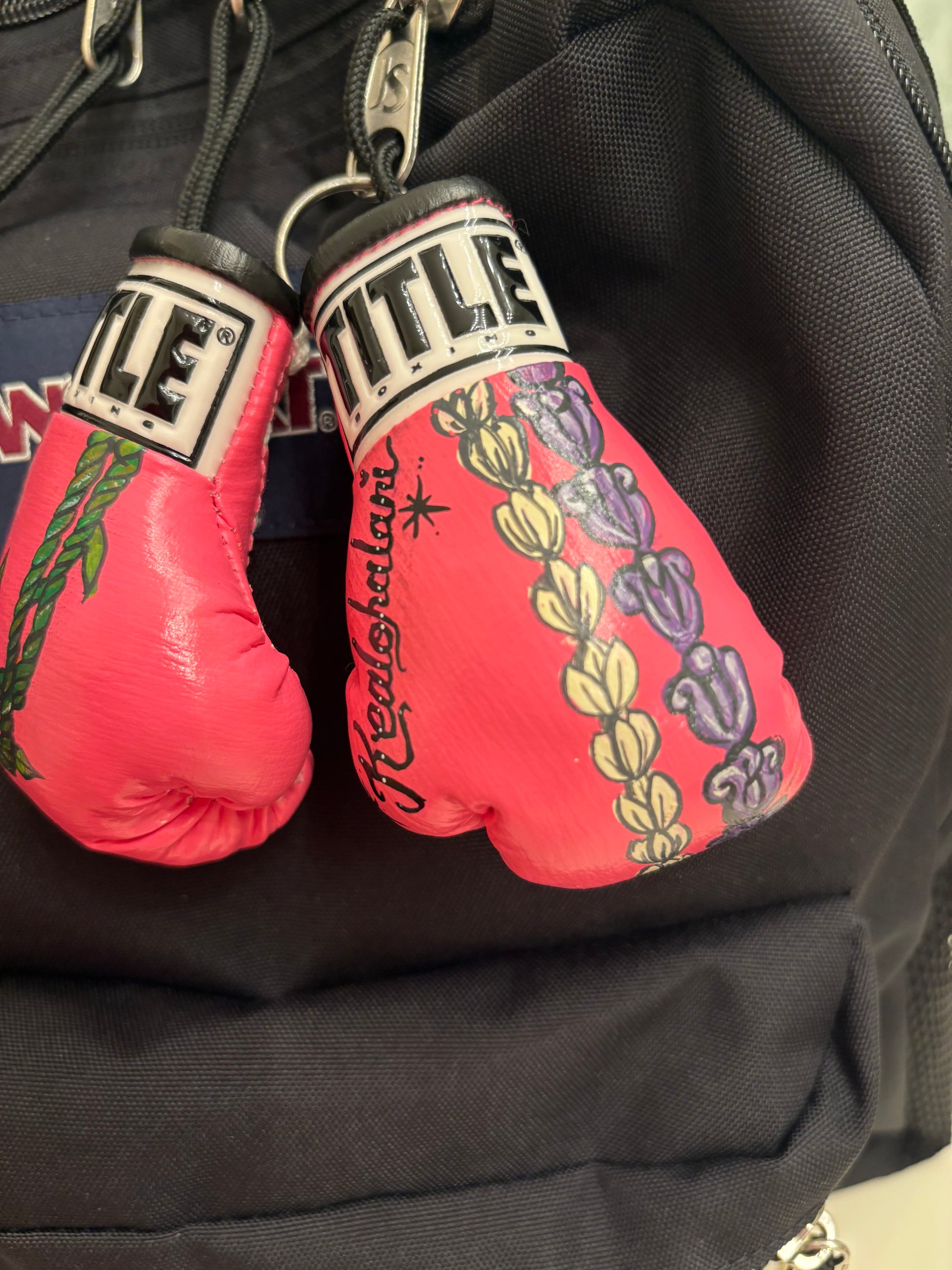 Novelty, hand-painted mini gloves customized for Kealohalani