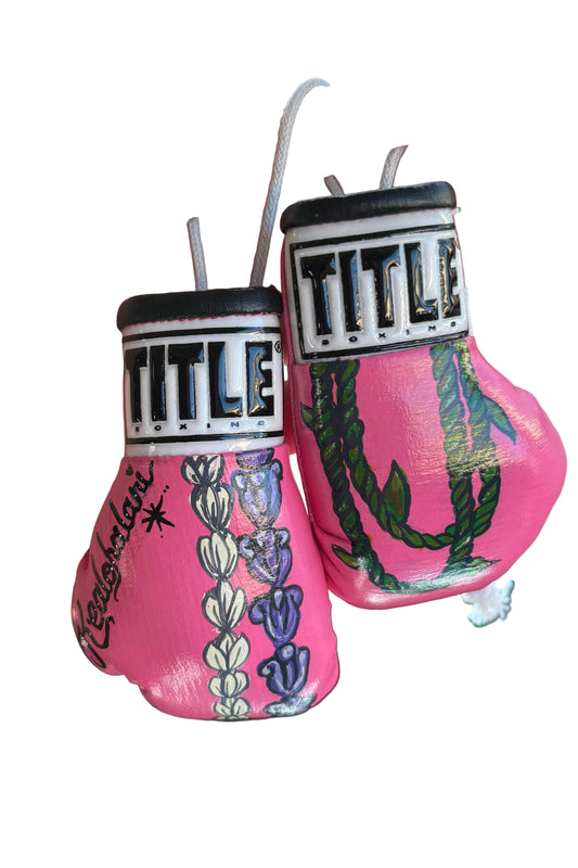 Customized, hand-painted, novelty, mini boxing gloves.